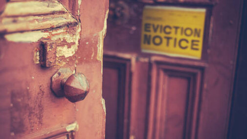 Eviction notive on older wooden door
